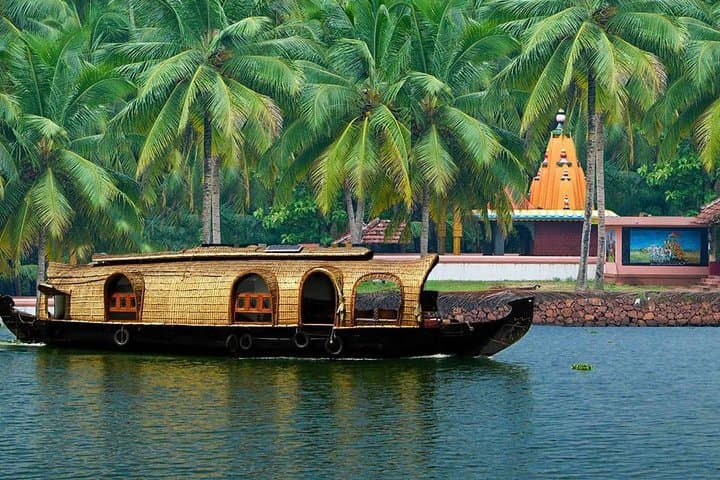 Overnight Alleppey Houseboat Cruise from Munnar — Private Kerala Backwaters Experience photo 3