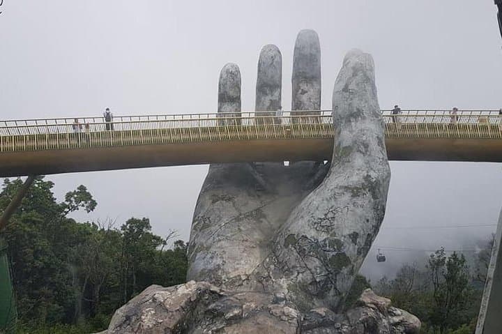 Ba Na Hills Golden Bridge Day Tour — Cable Car, Dragon Bridge & Marble Mountains photo 4