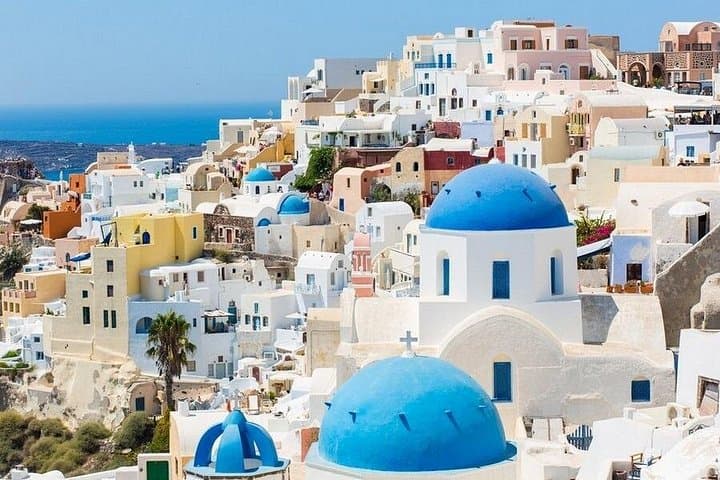 Santorini Day Trip by Catamaran from Rethymno — Oia & Fira Caldera Experience photo 1