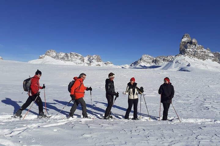Snowshoe the Dolomites: Cortina Winter Walk to a Mountain Hut