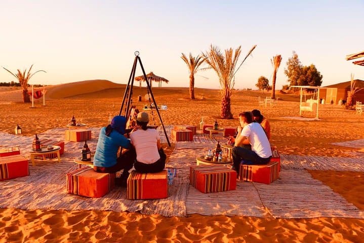 Merzouga Overnight: Luxury Desert Camp, Camel Sunset & Sandboarding Experience