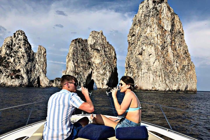 Sunset and Overnight Boat Stay at Capri's Faraglioni from Sorrento