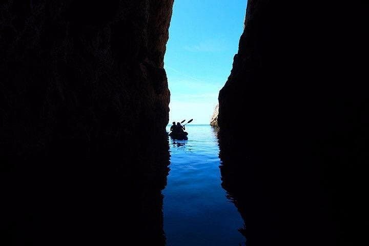 Sant Elm to Cala en Tió: Guided Kayak Tour & Snorkel to Dragonera's Caves photo 3