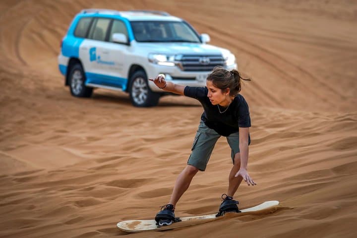 Dubai Desert Quad Bike Safari: Half-Day Quad Ride, Sandboarding & Camel Experience photo 5