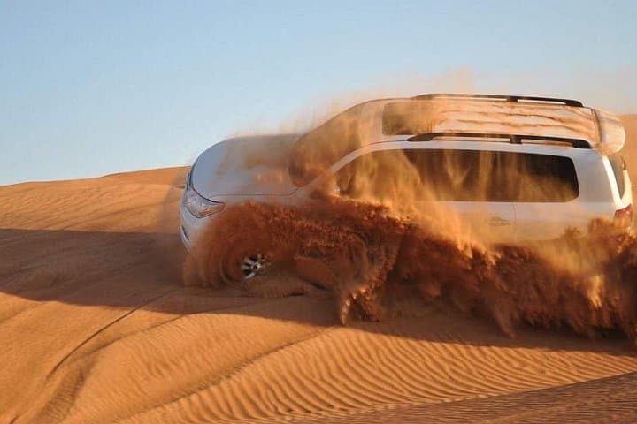 Morning Red Dunes Desert Safari: Dune Bashing, Sandboarding & Camel Rides Near Dubai