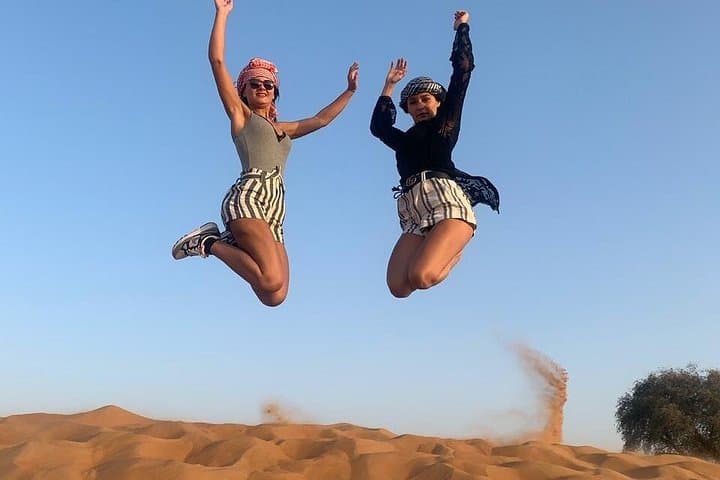 Morning Red Dunes Desert Safari: Dune Bashing, Sandboarding & Camel Rides Near Dubai photo 2