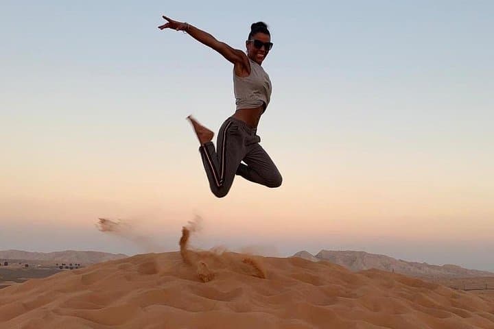 Morning Red Dunes Desert Safari: Dune Bashing, Sandboarding & Camel Rides Near Dubai photo 4