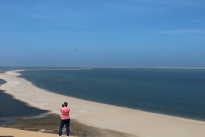 Sandwich Harbour 4x4 Tour: Dune Driving, Flamingo Lagoons & Ocean-Desert Meeting photo 1