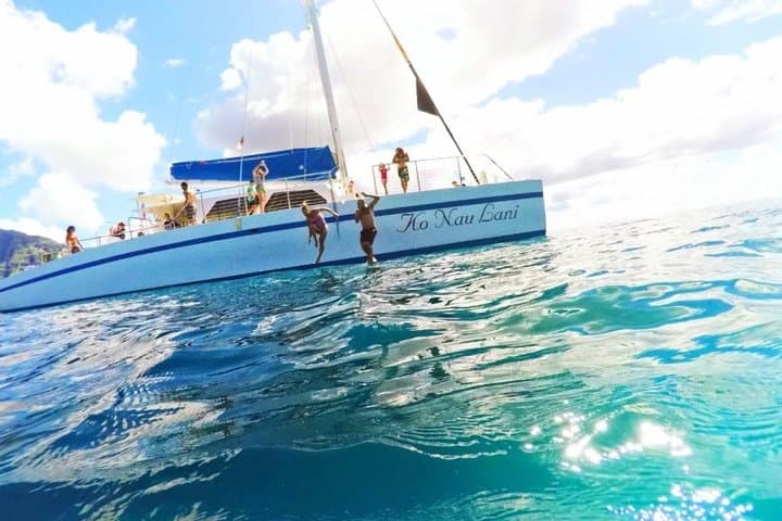 Catamaran to Isla Mujeres — Open Bar, Snorkel the Reef & Beach Club Day Trip photo 3