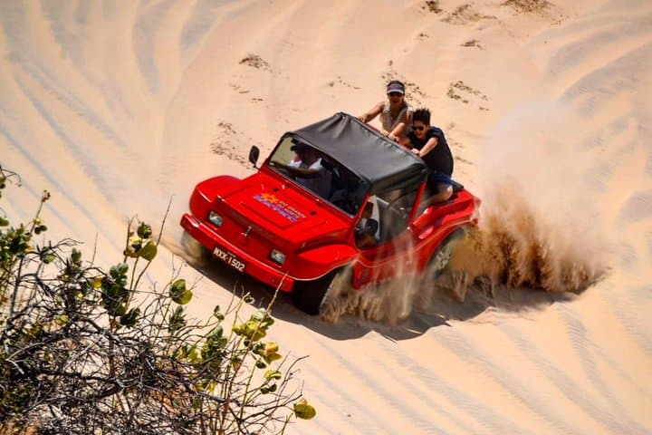 Genipabu Buggy Tour: Dunes, Lagoons & Zipline from Natal