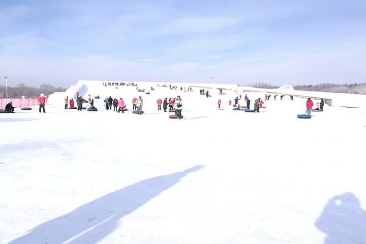 Harbin Sun Island Snow Fair: Small-Group Ice Slides, Snow Tubing & Frozen-Lake Fun photo 3
