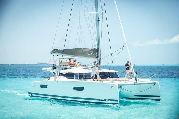 Private Catamaran to Isla Mujeres: Full-Day Snorkel, Beach Club & Transfer from Cancun photo 3