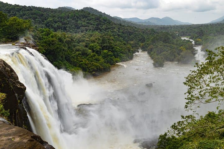 Athirappilly Falls & Cherai Beach Day Trip from Kochi — Waterfalls, Backwaters and Beach Activities