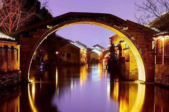 Private Night Tour to Wuzhen Water Town from Hangzhou — Evening Canals & Riverside Dinner photo 2