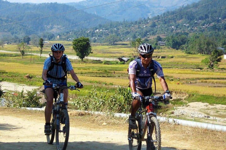 Kathmandu Day Cycling Tour — Chobhar Gorge, Temples & Street Flavors photo 3