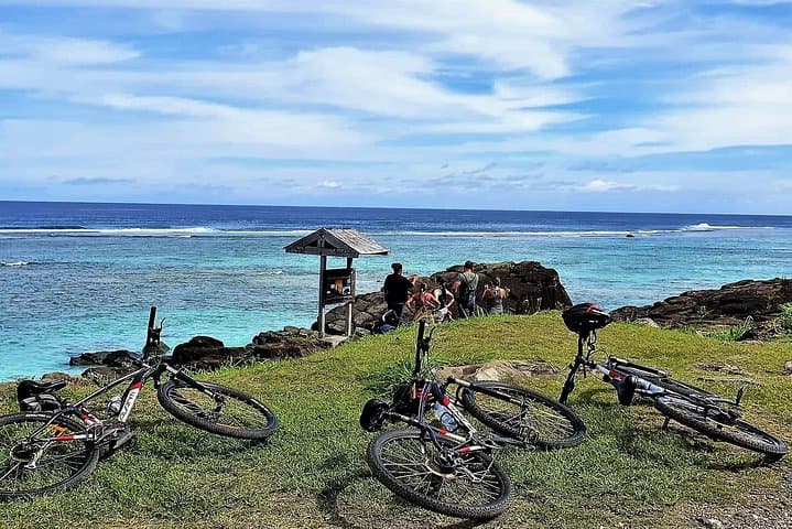 Cycle Rarotonga’s Back Road: Village Ride, Mountain Views & Lunch