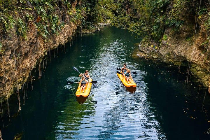 Xenotes Four-Cenote Adventure — Rappel, Zip, Kayak & Swim from Cancun photo 1