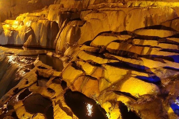 Into Jiuxiang: Private Day Tour to Caves, Valleys & Yi Village from Kunming