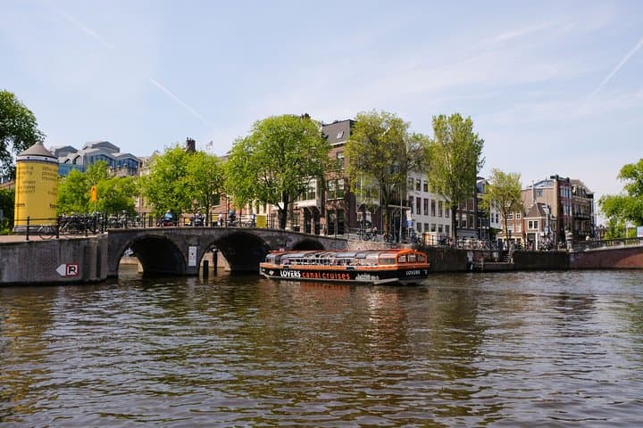 Amsterdam 1-Hour Solar Canal Cruise: Semi-Open Boat with Multilingual Audio Guide photo 4