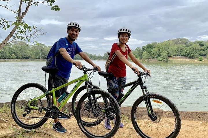 Full-Day Angkor Temple Bike Tour: Explore Angkor Wat, Angkor Thom & Jungle Temples photo 4