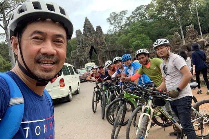 Full-Day Angkor Temple Bike Tour: Explore Angkor Wat, Angkor Thom & Jungle Temples photo 5