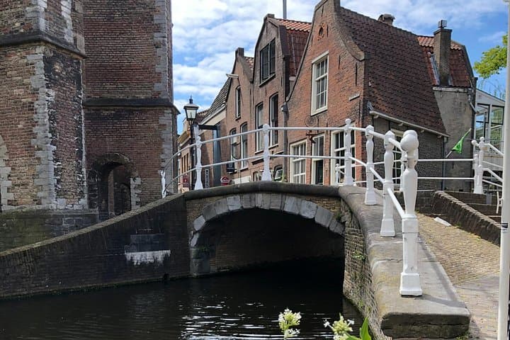 Cycle Delft: Guided Cultural Bike Tour Through Historic Canals and Courtyards photo 2