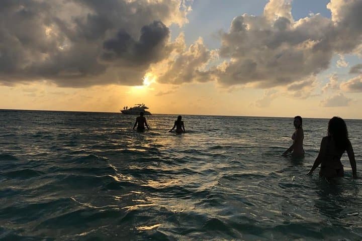 Riviera Maya Private 51' Leopard Yacht: 4-Hour Open Bar & Chef Snorkel Charter photo 3