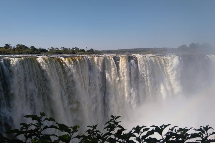Victoria Falls Guided Tour with Pickup: Half-Day Falls, Baobab & Lookout Café photo 2