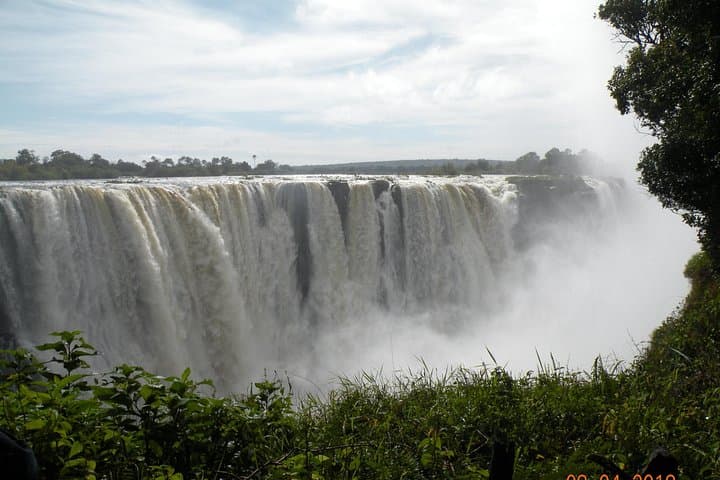 Victoria Falls Guided Tour with Pickup: Half-Day Falls, Baobab & Lookout Café photo 4