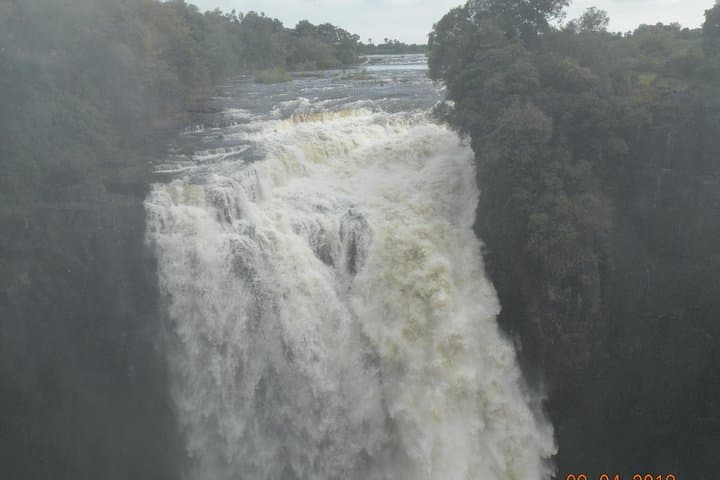 Victoria Falls Guided Tour with Pickup: Half-Day Falls, Baobab & Lookout Café photo 5