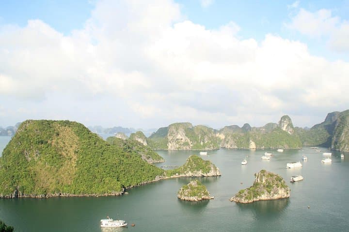 Halong Bay Full-Day Cruise: Surprise Cave, Titop Island, Kayaking & Swimming photo 1