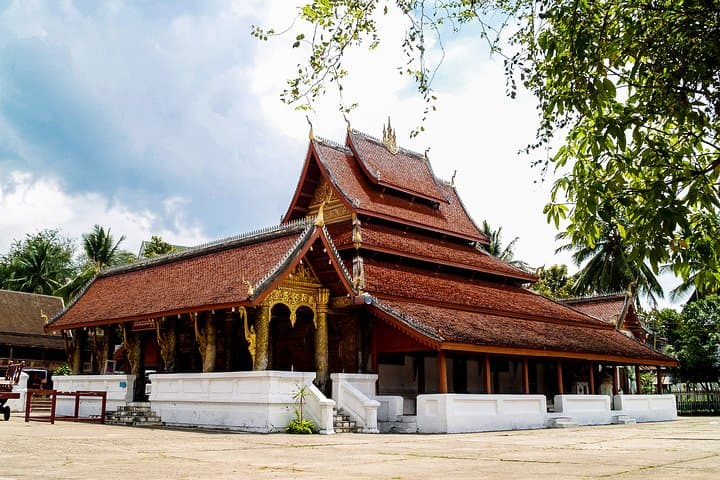 Essence of Luang Prabang: Half-Day Temple & Mount Phousi Tour photo 4