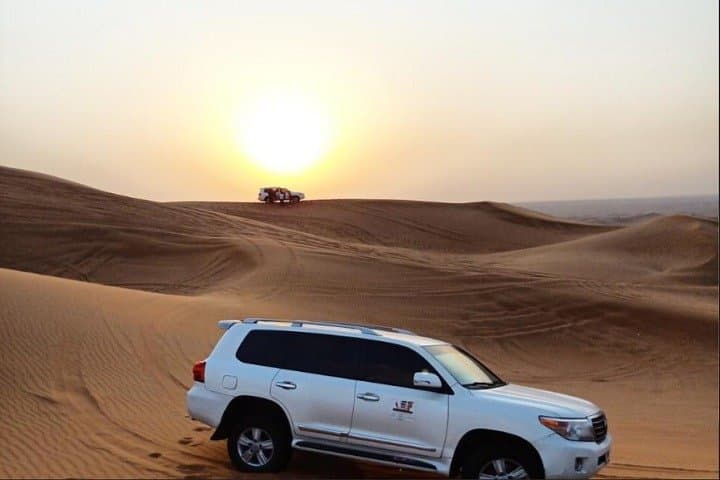 Dubai Sunset Desert Safari: Dune Bashing, Camel Ride & BBQ Camp Experience photo 4