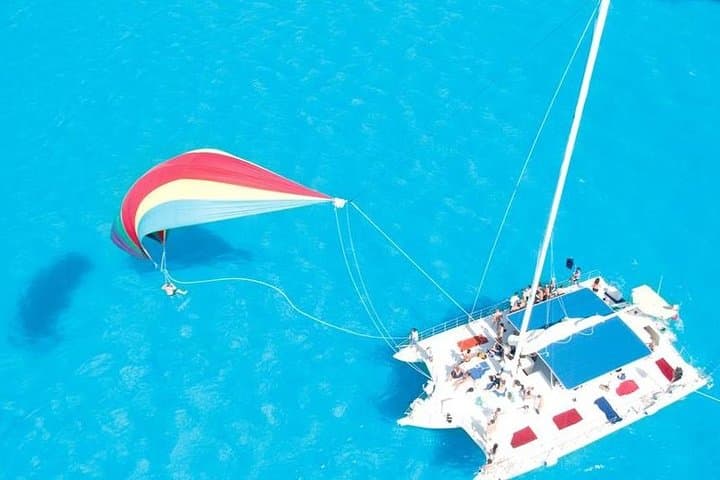 Catamaran Sailing to Isla Mujeres: Snorkel, Open Bar & Beach Club Day Trip from Cancun photo 3
