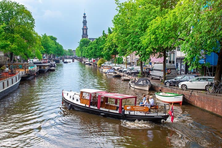 Electric Amsterdam Canal Cruise with Dutch Snacks and Drinks — 2-Hour Small-Group Tour