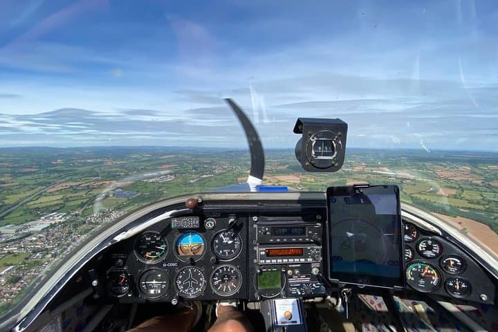 Mile-High Motorglider: Silent Gliding Over Devon’s Moor and Coast