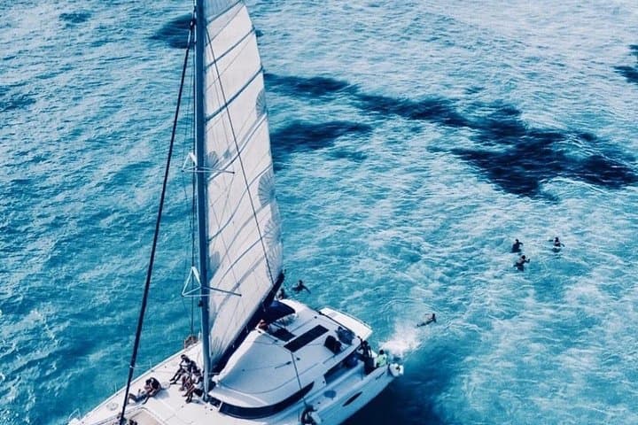 Catamaran Sailing to Isla Mujeres: Snorkel, Open Bar & Beach Club Lunch photo 1