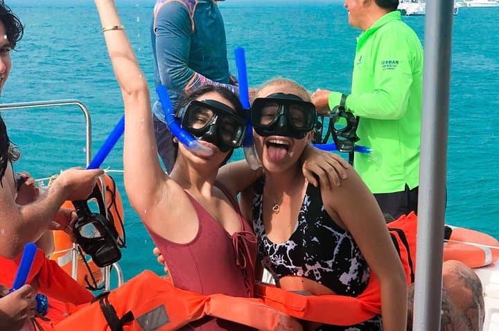 Catamaran Sailing to Isla Mujeres: Snorkel, Open Bar & Beach Club Lunch photo 2