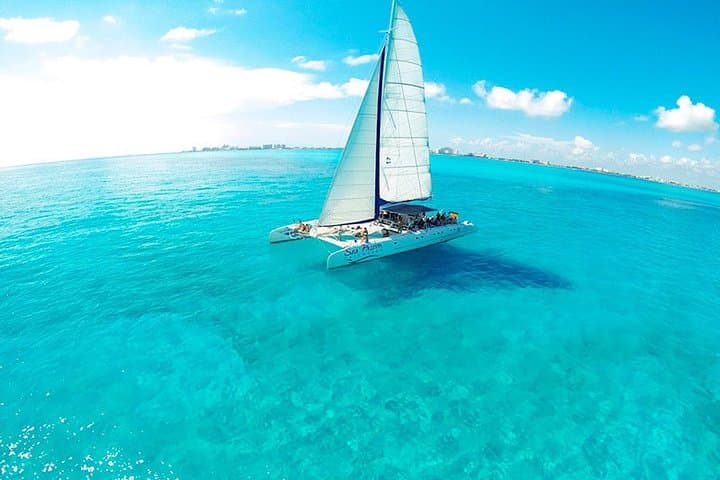 Full-Day Catamaran to Isla Mujeres: Snorkeling, Spinnaker & Beach Club photo 1