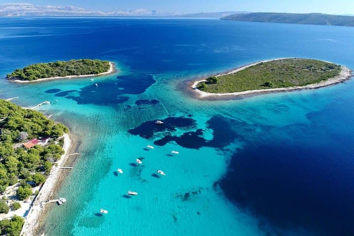 Blue Lagoon, Trogir & Čiovo Catamaran Tour from Split — Swim, UNESCO Trogir & All-Inclusive Drinks photo 2