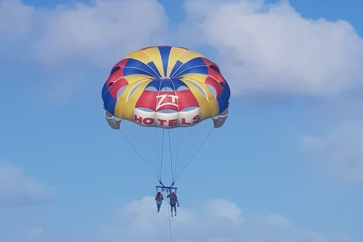 Parasailing Adventure Over Punta Cana's Turquoise Coast photo 3