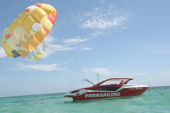 Parasailing Adventure Over Punta Cana's Turquoise Coast photo 4