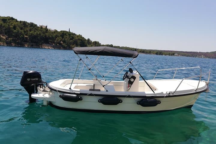 West Coast Brac Boat Tour: Hidden Bays, Snorkeling & Seaside Villages photo 2