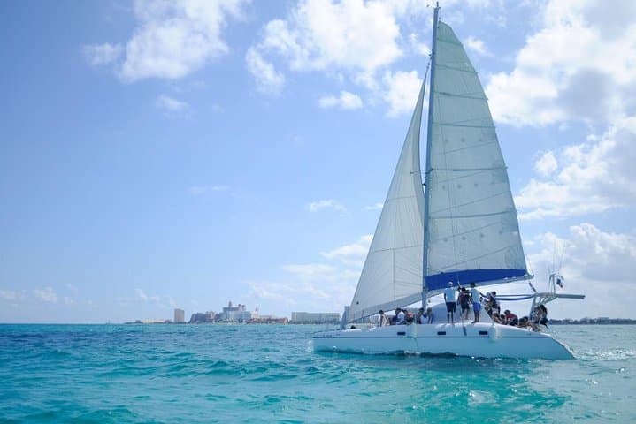 Half-Day Private Catamaran Sailing to Isla Mujeres: Snorkel, Drinks & Beach Time photo 2