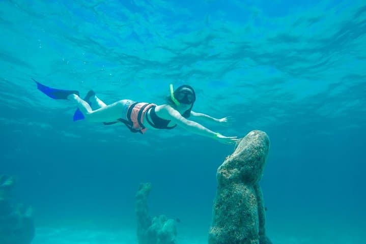 Half-Day Private Catamaran Sailing to Isla Mujeres: Snorkel, Drinks & Beach Time photo 3