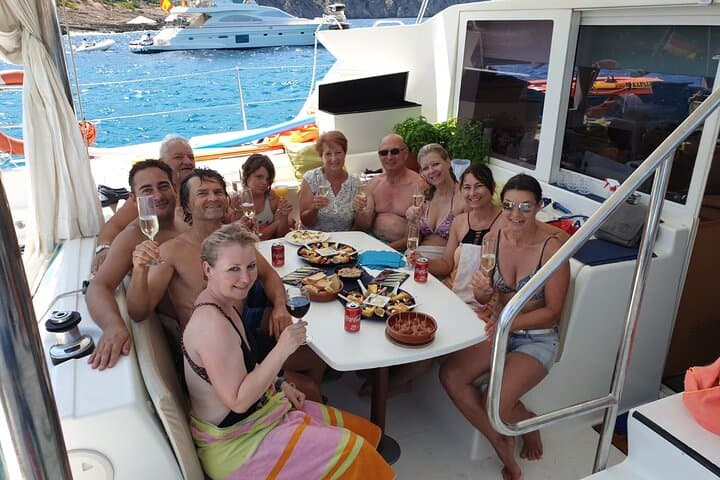 Mallorca Catamaran Cruise with Tapas: 4-Hour Swim, Snorkel & SUP from Palma photo 2