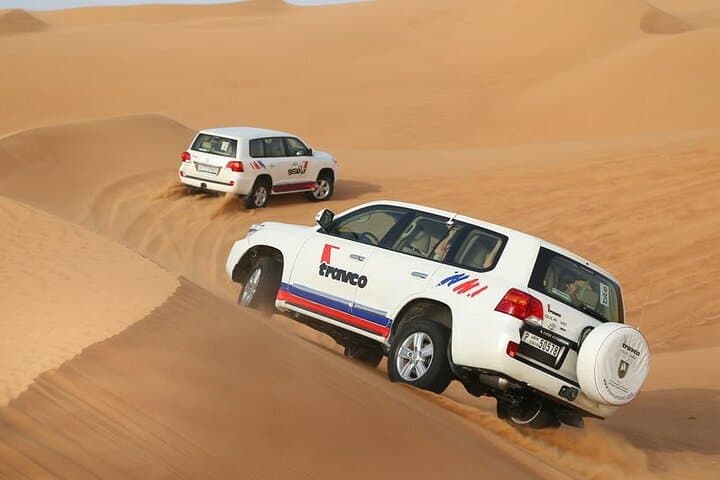 Morning Dubai Desert Safari: Dune Bashing, Camel Ride & Sandboarding photo 2