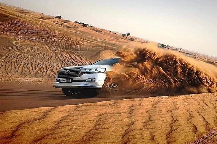 Dubai Desert Safari: Camel Riding, Sandboarding & Dune Bashing Adventure photo 3