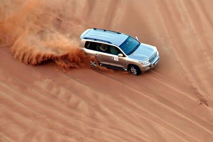 Dubai Desert Safari: Camel Riding, Sandboarding & Dune Bashing Adventure photo 4