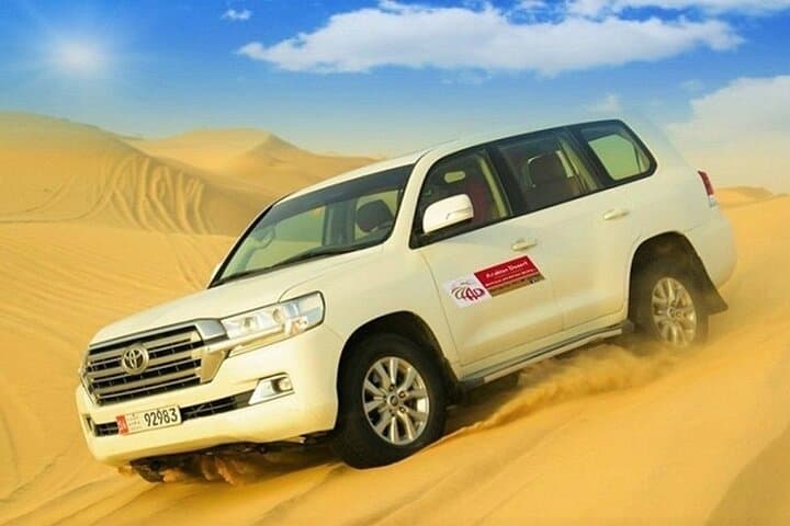 Morning Abu Dhabi Desert Safari: 4-Hour Dune Bashing, Camel Ride & Sandboarding photo 6